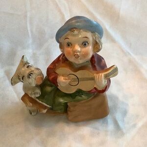Vintage Scotty dog and Boy playing Banjo. Ceramic.